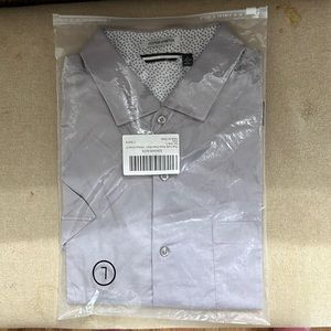 Unopened men’s dress shirt grey size large. Still in packaging. No damages